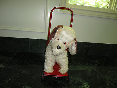 stuffed dog on wheels