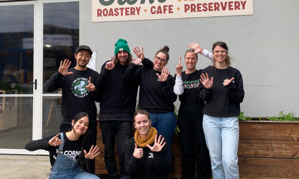 Team CSN stand out the front of our roastery & preservery smiling and holding up six fingers each to mark our 6th birthday celebration
