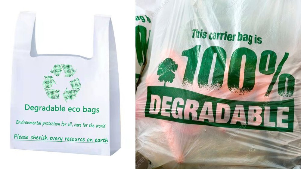 white carry bag with green words saying degradable eco bags next to a white plastic bag with label 100% degradable