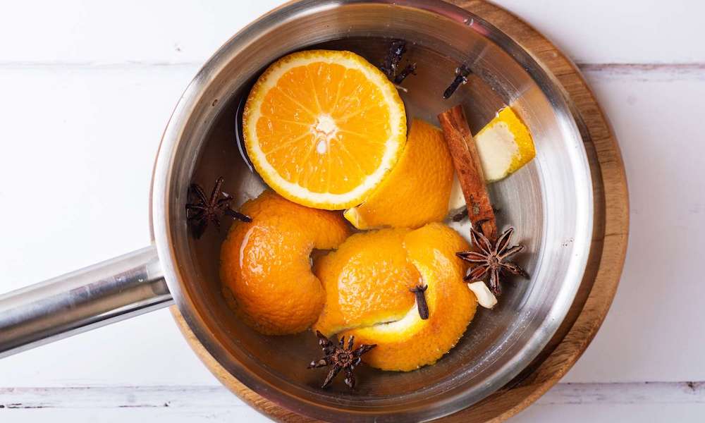orange, cinnamon and cloves in a pot of water to make air freshener