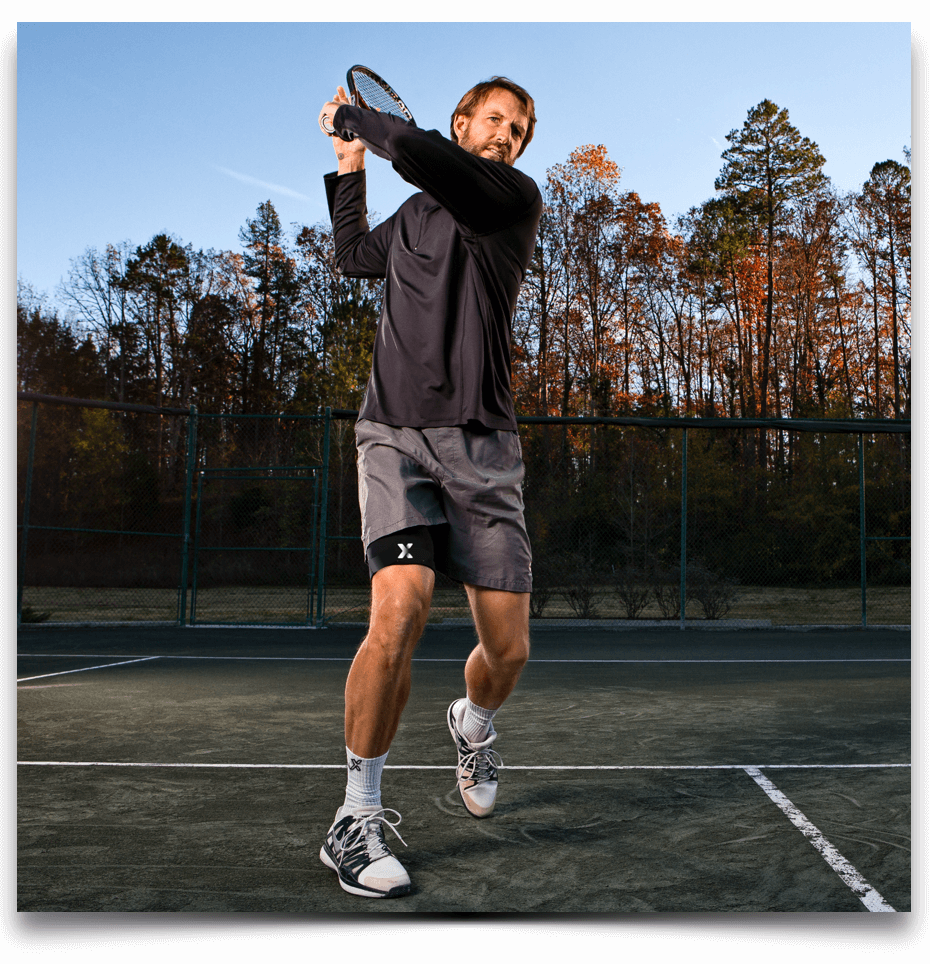 Athlete Tennis player wearing Body Helix Thigh Helix.