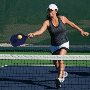 woman playing pickleball