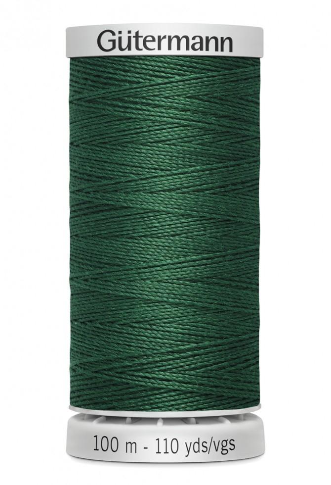 A green reel of thread