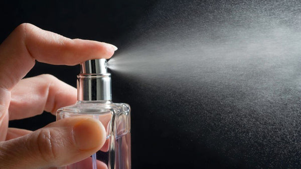 musky perfume being sprayed