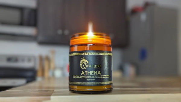 a lit athena candle