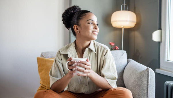 a woman relaxing and feeling better