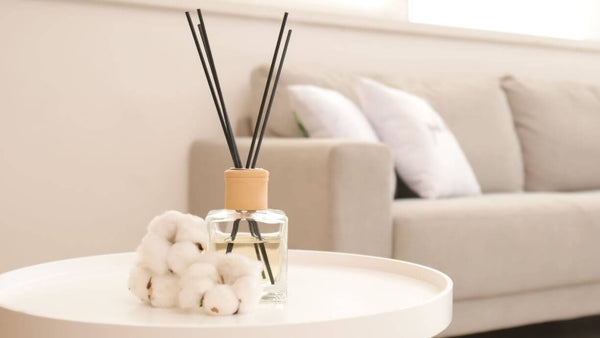 a reed diffuser on a table