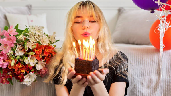 woman with cake and candles