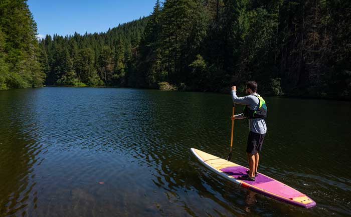 Paddling a SUP on the river