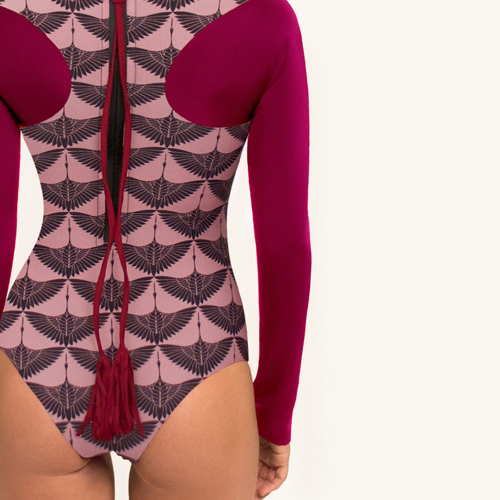 woodlike ocean full suit with long sleeves in berry and print color. One suit with regenerated Italian fabric with 50+ protection  and zipper at back