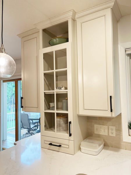 Enamel Painted kitchen cabinets after transformation. Color Edgecomb Grey by Benjamin Moore