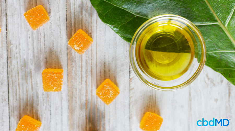 CBD Gummies and CBD Oil on Table