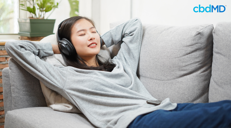 Woman Relaxing on Couch After Taking CBN Product