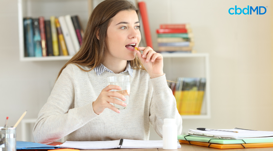 Woman Taking THCV Products for Focus at Work