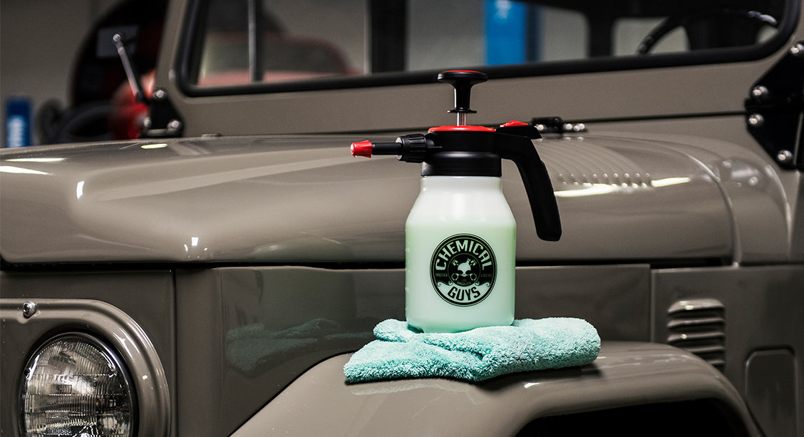 Mr. Sprayer atop a microfiber towel on a freshly detailed Jeep