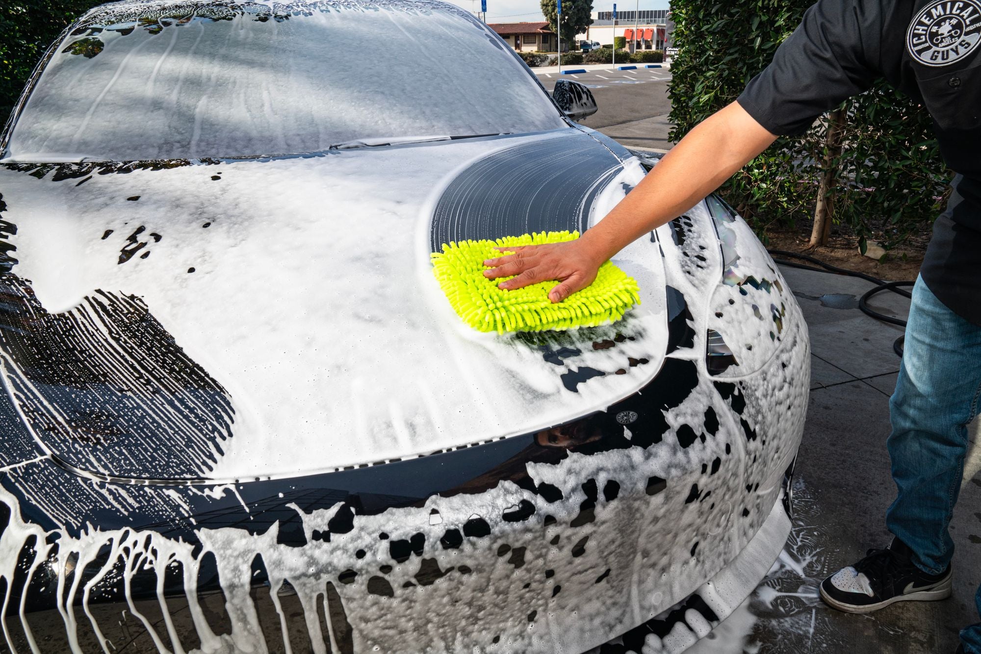 Washing the hood of a car with the Chenille Wash Pad