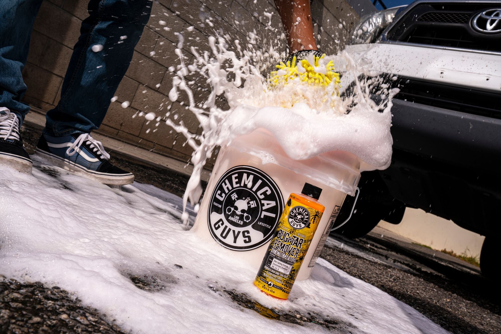 Using Bug & Tar Remover with a bucket & wash mitt to create sudsy foam to wash a car.