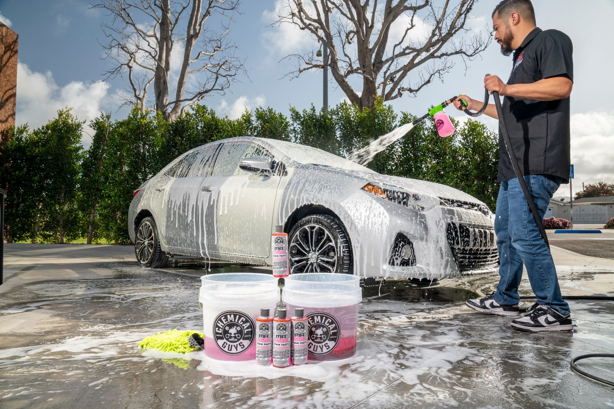 Washing a car with Mr. Pink Foam Party, TORQ Foam Blast 6, two buckets, and a chenille car wash mitt