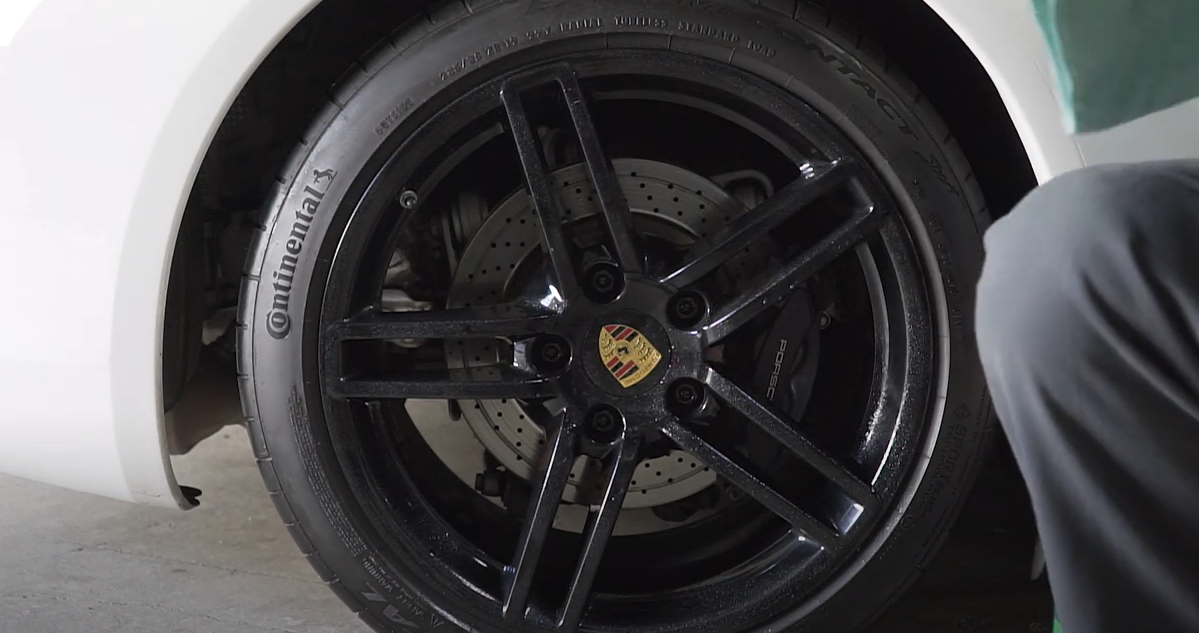 Rinsing Black Wheels Before Cleaning 