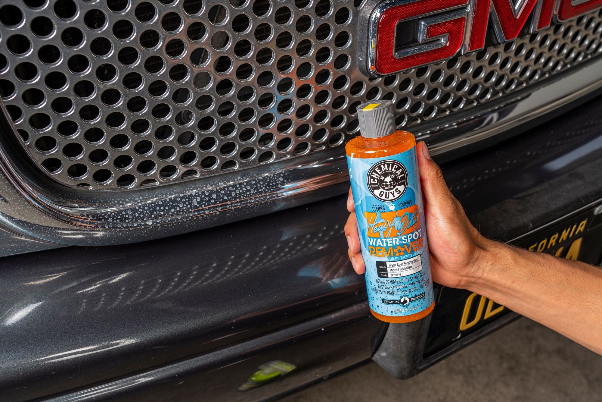 Removing water spots from a truck grille using Heavy Duty Water Spot Remover