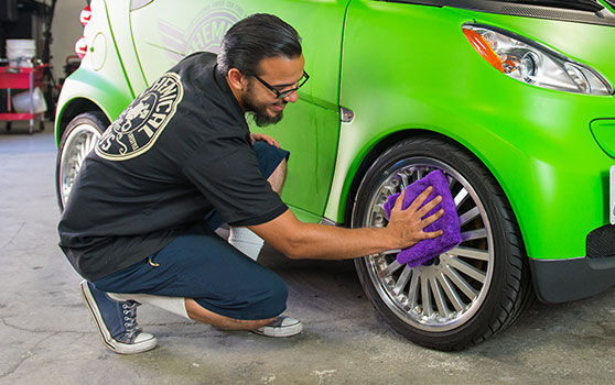 Wiping Off and Buffing Car Wheels