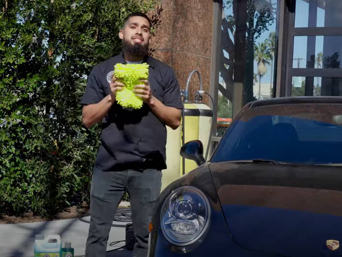 Holding a Chenille Microfiber Car Wash Mitt