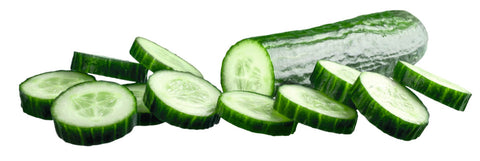 Fresh cucumber slices arranged on a spa towel, showcasing natural skincare and beauty benefits