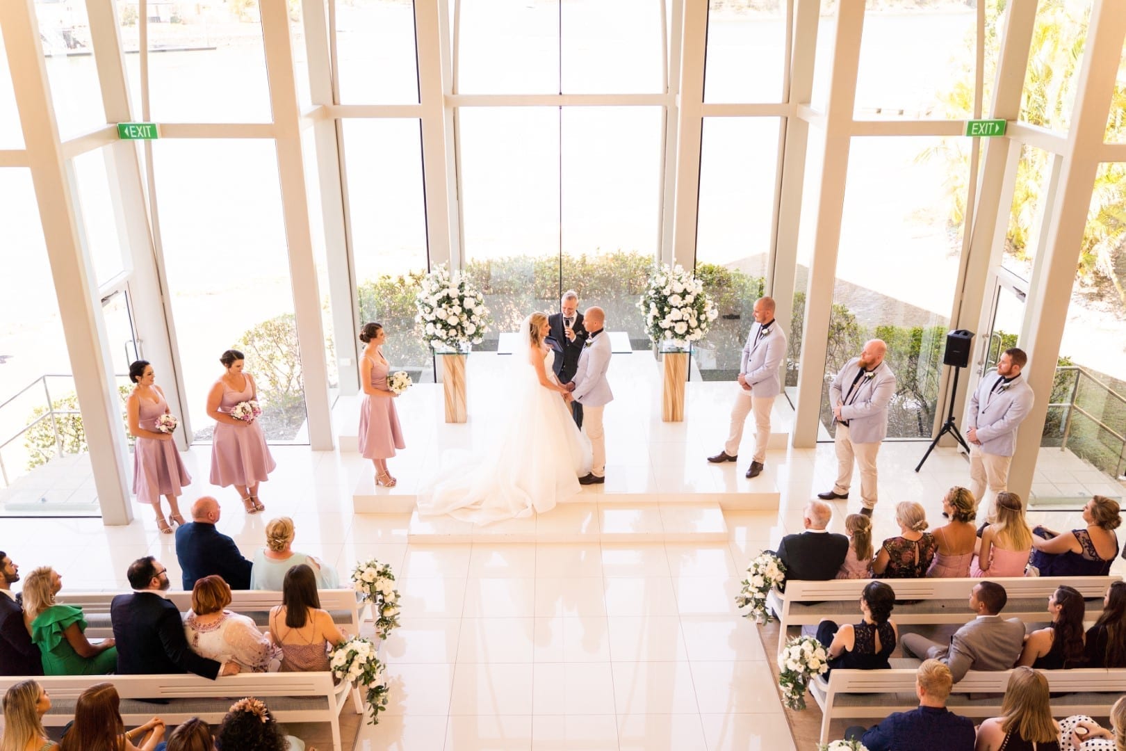 The wedding party at the alter.