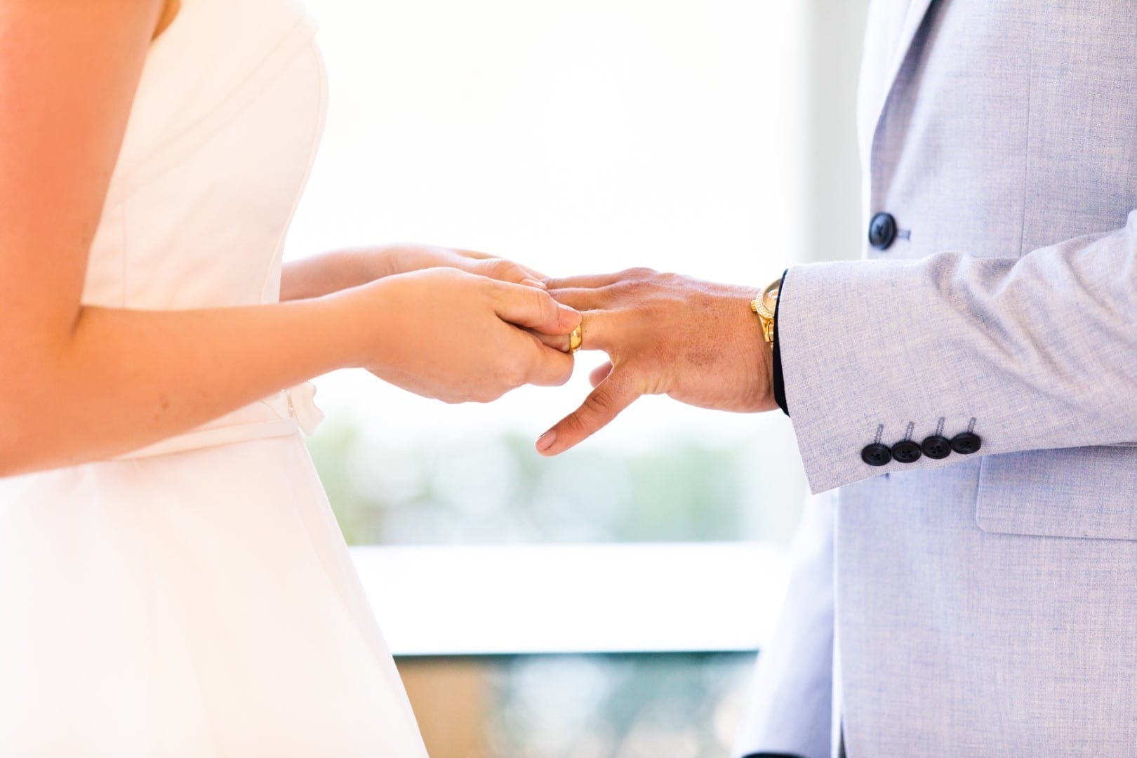 Jess puts Khan's ring on his finger.