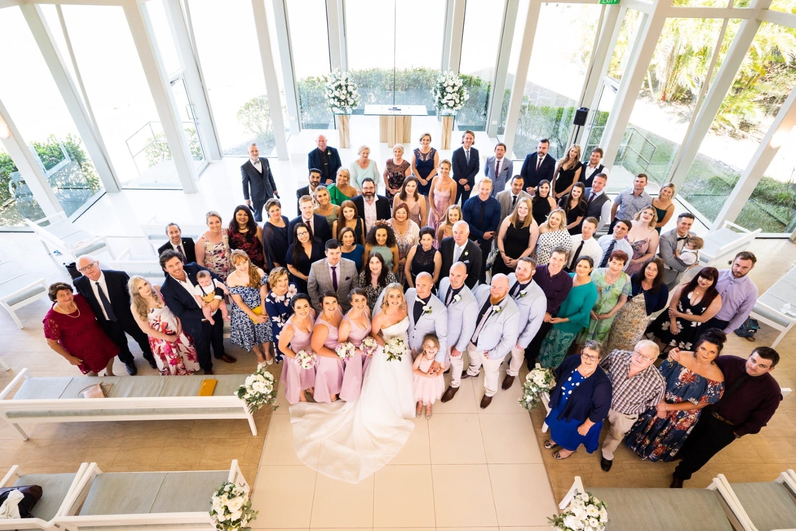 The bride and groom with their attendees. 