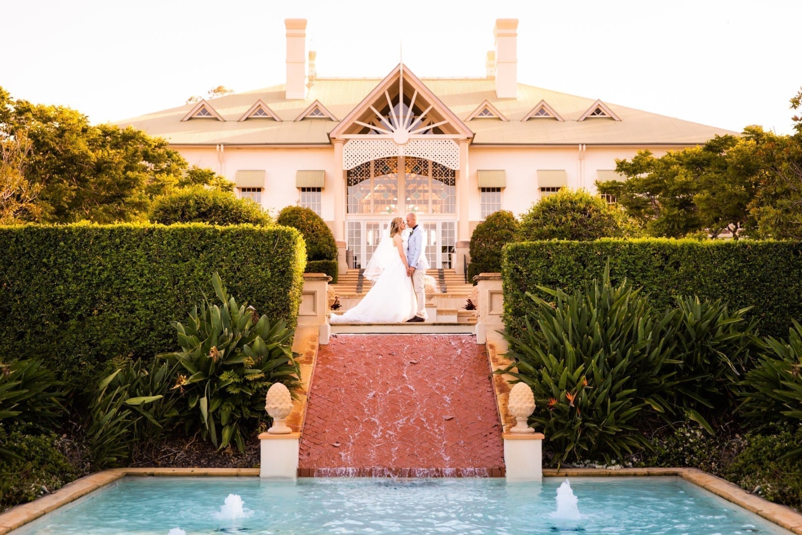 Bride and Groom with the gorgeous surrounds at Sanctuary Cove.