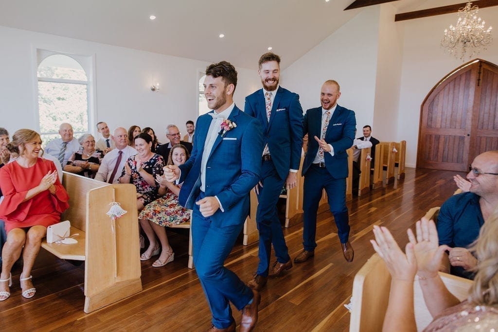The groomsmen with wedding guests