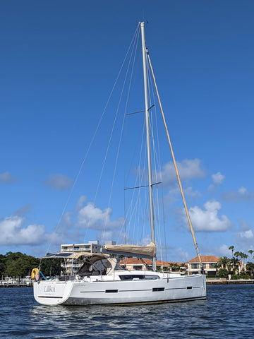 dufour 412 sailboat at anchor