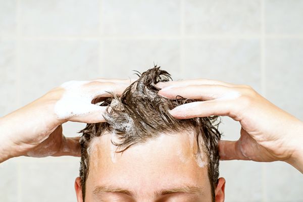 Man Washing His Hair | ISA Professional