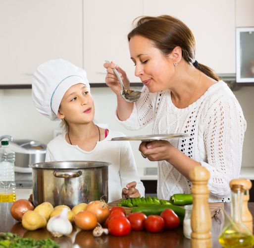 Woman And Daughter Eating A Healthy Meal | ISA Professional