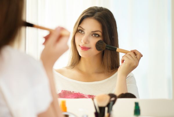 Woman Applying Makeup | ISA Professional