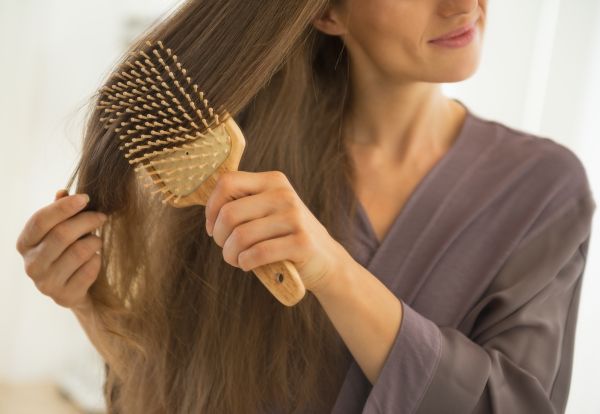 Woman Brushing Her Long Hair | ISA Professional