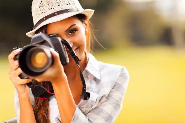 Woman Taking A Photograph | ISA Professional