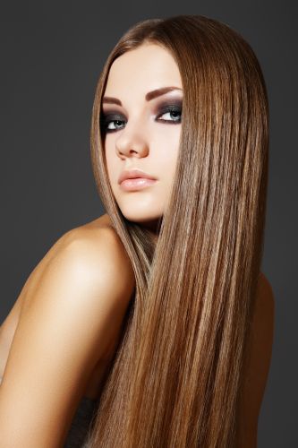 Woman With Sleek, Straight Hair- ISA Professional