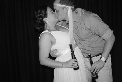 Bent-back kiss with Tapps in hand from David's wedding