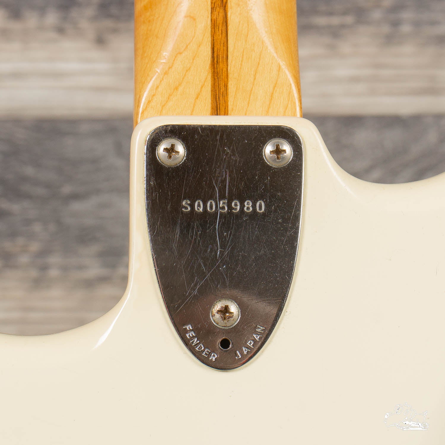 squier serial number on neck plate