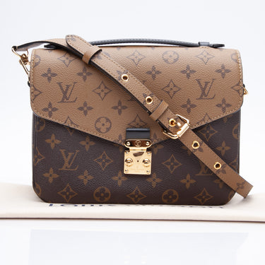 LOUIS VUITTON  Pochette Voyage Eclipse Reverse Canvas MM