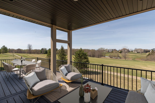 An virtually staged deck on the second story of a new construction home