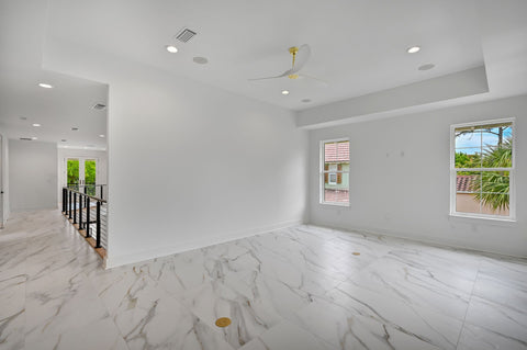 a loft space in a home that has no furniture or decor.