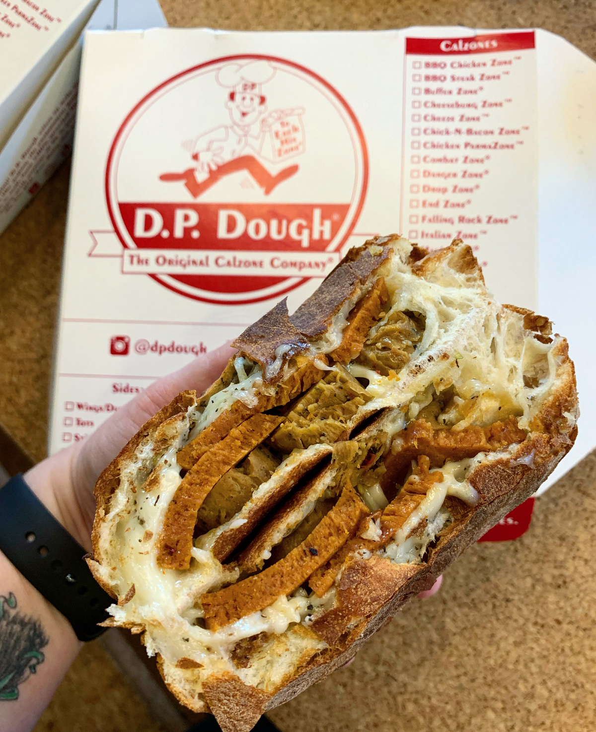 vegan calzone with plant based meat and dairy free cheese from D P Dough