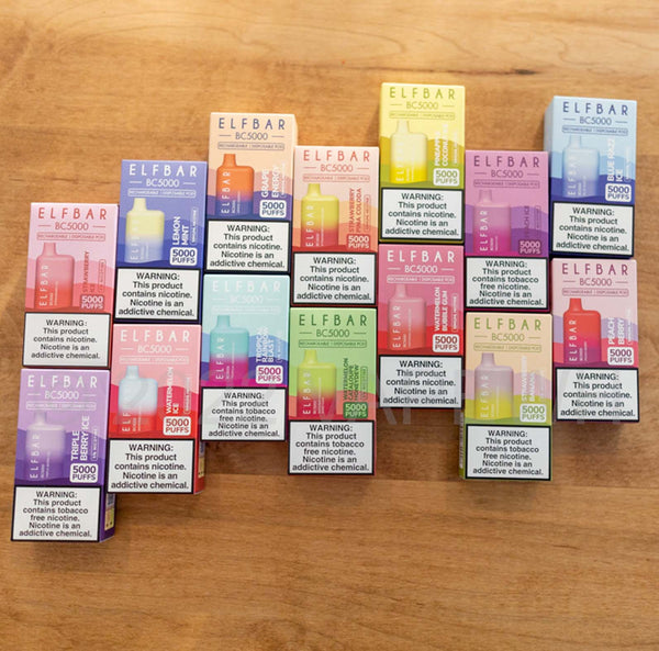 A colorful array of Elf Bar boxes is organized on a wood background.