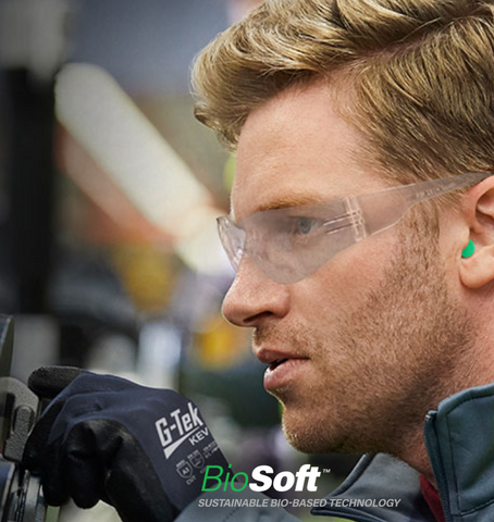 Worker wearing green sustainable uncorded ear plug