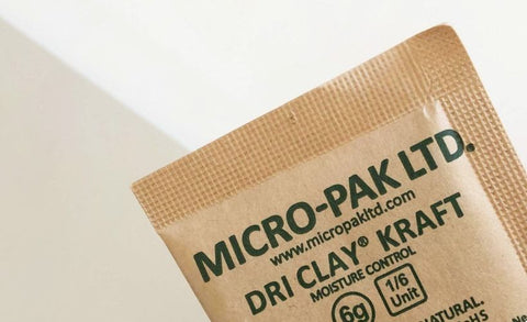 Close up of Micro-Pak Dri Clay Kraft Packet
