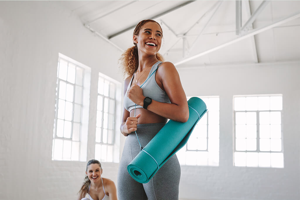 girl with yoga mat