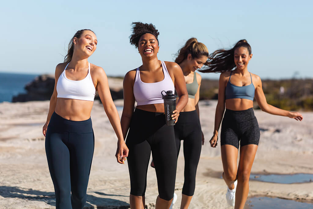 group of friends running for fitness